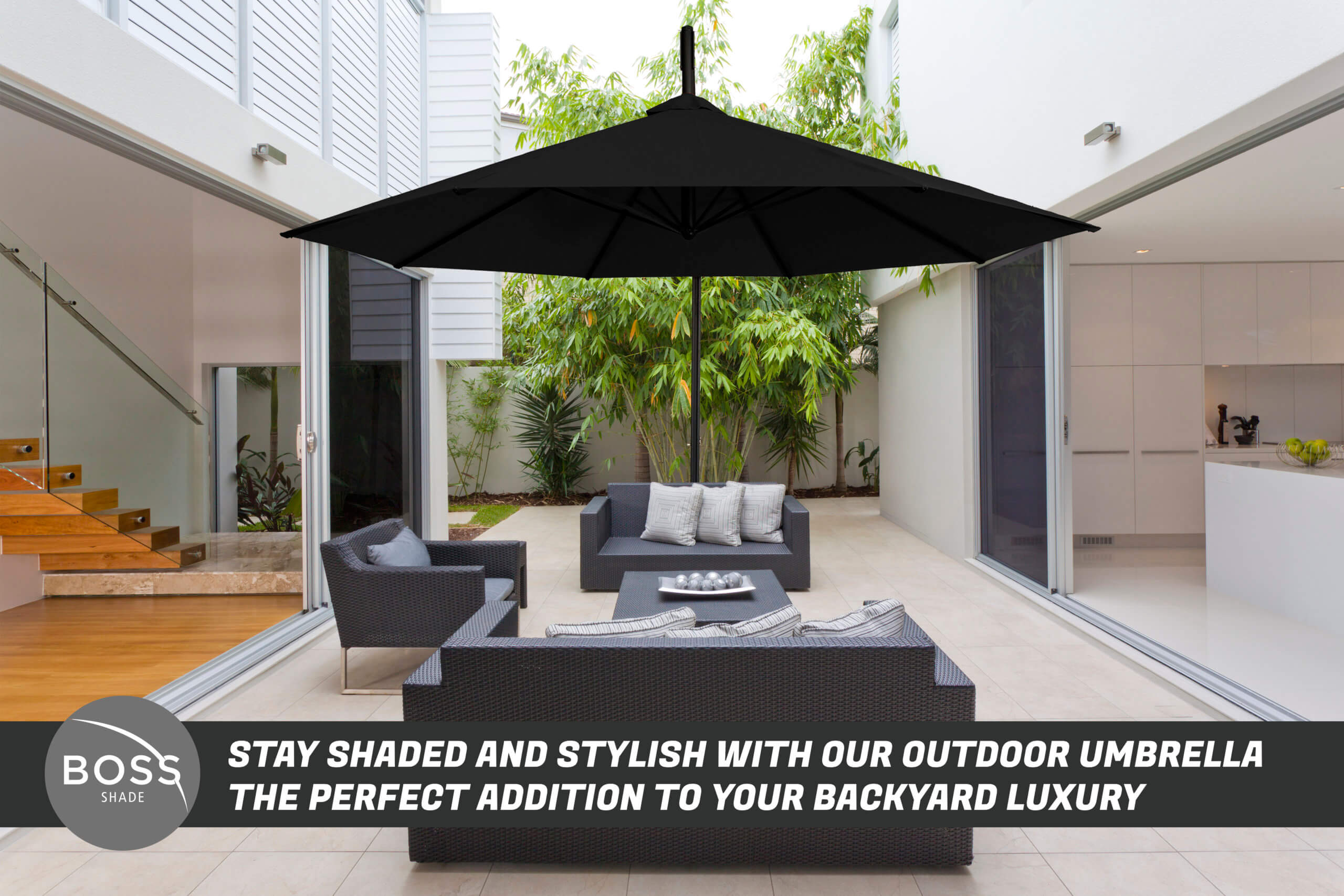 backyard lounge with black umbrella