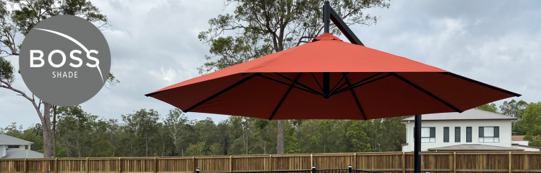 installed red cantilever umbrellas